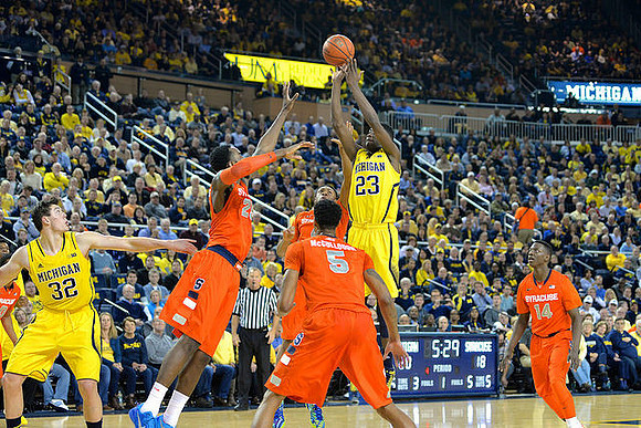 Ricky Doyle (32) and Caris LeVert (23)