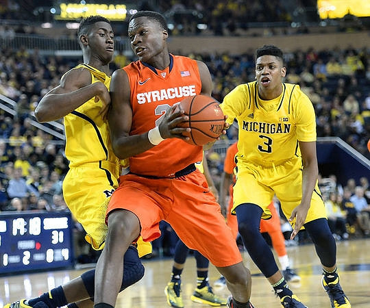 Caris LeVert (23) and Kameron Chatman (3)