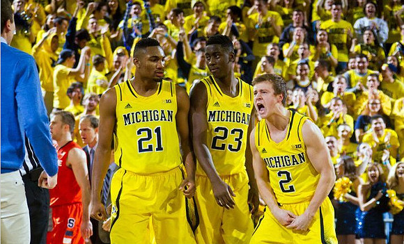 Zak Irvin (21), Caris LeVert (23), and Spike Albrecht (2)