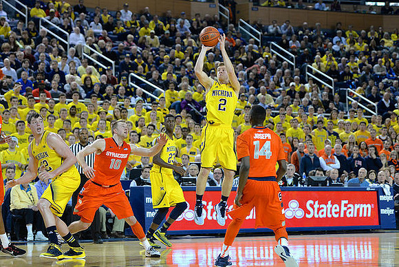 Ricky Doyle (32), Caris LeVert (23), and Spike Albrecht (2)