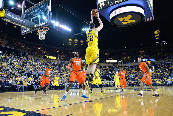 Derrick Walton Jr. (10), Ricky Doyle (32), Caris LeVert (23), and Spike Albrecht (2)