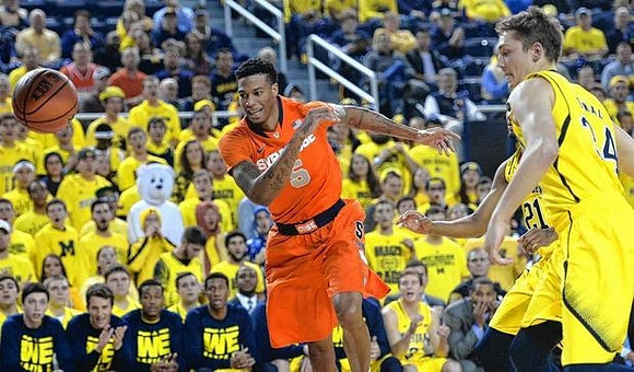 Zak Irvin (21) and Mark Donnal (34)