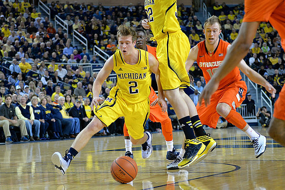 Spike Albrecht (2) and Ricky Doyle (32)