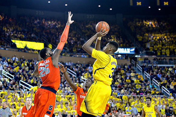 Kameron Chatman (3) and Derrick Walton Jr. (10)