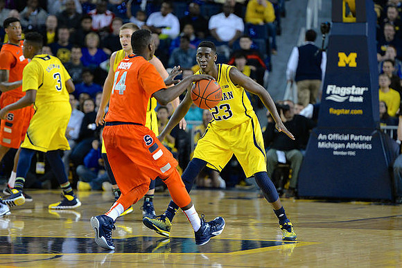 Kameron Chatman (3), Max Bielfeldt (44), and Caris LeVert (23)