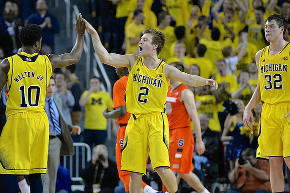 Derrick Walton Jr. (10), Spike Albrecht (2), and Ricky Doyle (32)
