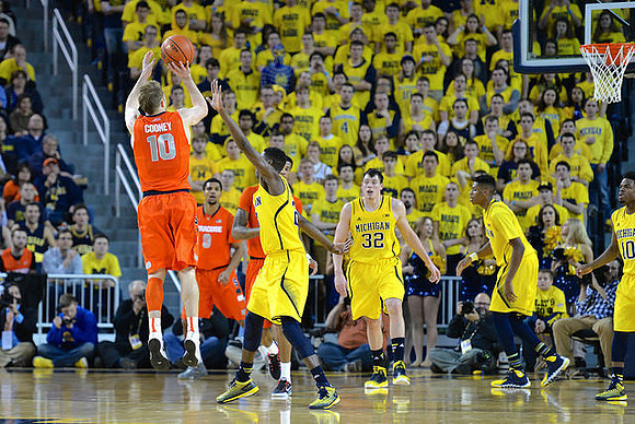 Caris LeVert (23), Ricky Doyle (32), Kameron Chatman (3), and Derrick Walton Jr. (10)