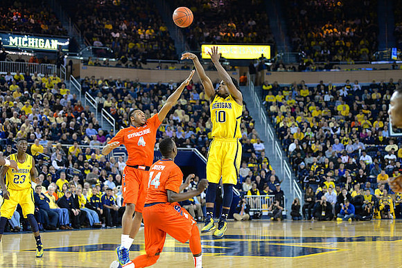 Caris LeVert (23) and Derrick Walton Jr. (10)