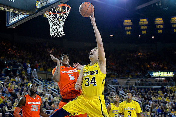 Mark Donnal (34), Zak Irvin (21), and Kameron Chatman (3)