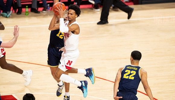 DeVante' Jones (12) and Caleb Houstan (22)