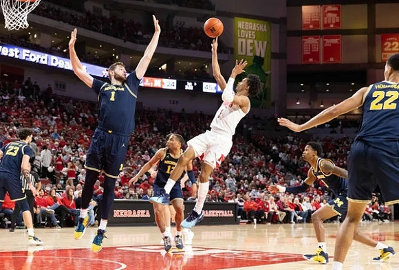 Brandon Johns Jr. (23), Hunter Dickinson (1), DeVante' Jones (12), Zeb Jackson (3), and Caleb Houstan (22)