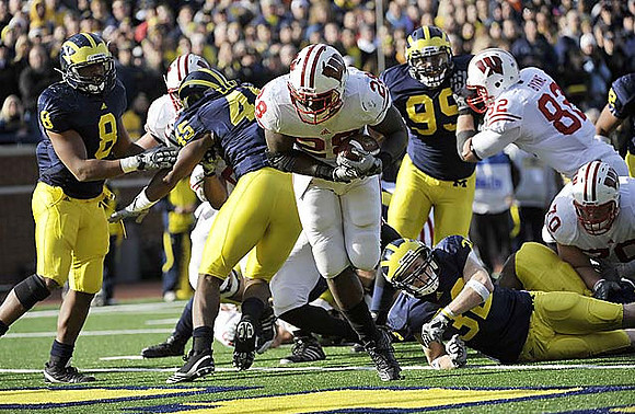 Jonas Mouton (8), Obi Ezeh (45), Adam Patterson (99), and Jordan Kovacs (32)