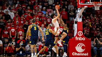 Brandon Wade (4), Caleb Houstan (22), and Eli Brooks (55)