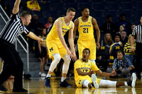 Duncan Robinson (22), Muhammad-Ali Abdur-Rahkman (12), and Zak Irvin (21)
