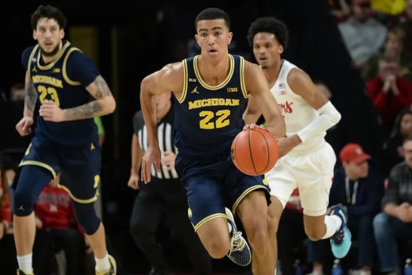 Brandon Johns Jr. (23) and Caleb Houstan (22)