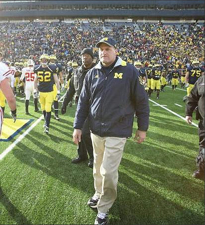 Kevin Leach (52), Rich Rodriguez, Ricky Barnum (56), and Michael Schofield (75)