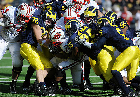 Jordan Kovacs (32), Greg Banks (92), Kenny Demens (25), Courtney Avery (5), and Jibreel Black (55)