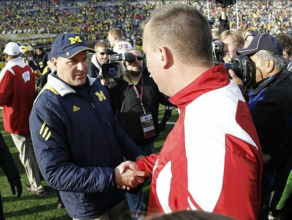 Rich Rodriguez and Bret Bielema