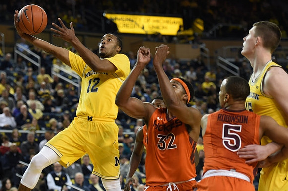 Muhammad-Ali Abdur-Rahkman (12) and Jon Teske (15)