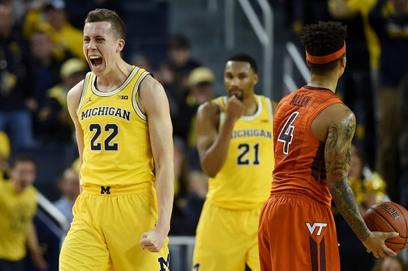 Duncan Robinson (22) and Zak Irvin (21)