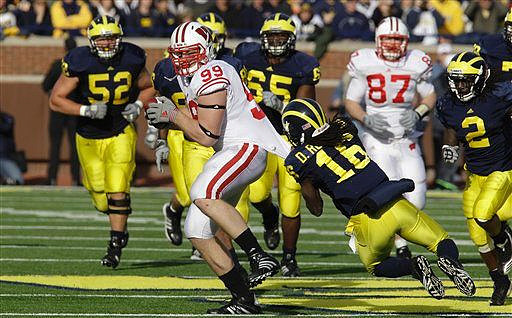 Stephen Schilling (52), Patrick Omameh (65), Denard Robinson (16), and Vincent Smith (2)