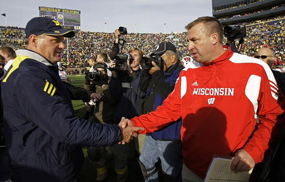 Rich Rodriguez and Bret Bielema