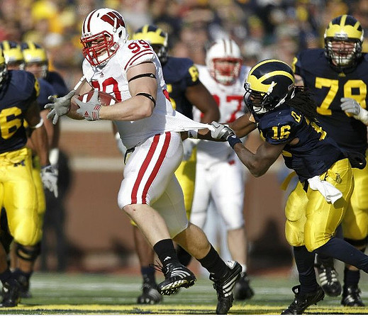 Kevin Koger (86), Patrick Omameh (65), Denard Robinson (16), and Perry Dorrestein (79)