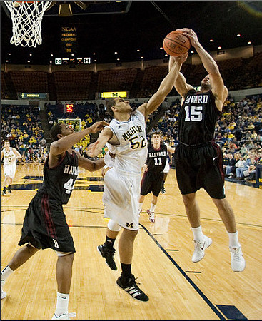 Jordan Morgan (52) and Zack Novak (0)