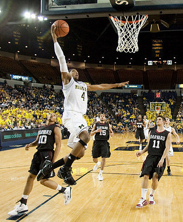 Darius Morris (4) and Zack Novak (0)
