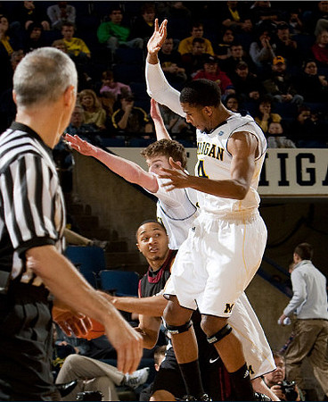 Evan Smotrycz (23) and Darius Morris (4)