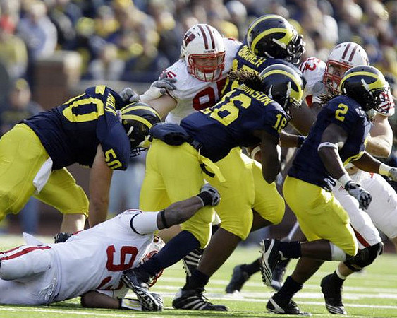 David Molk (50), Patrick Omameh (65), Denard Robinson (16), and Vincent Smith (2)