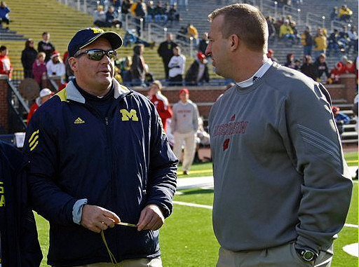 Rich Rodriguez and Bret Bielema