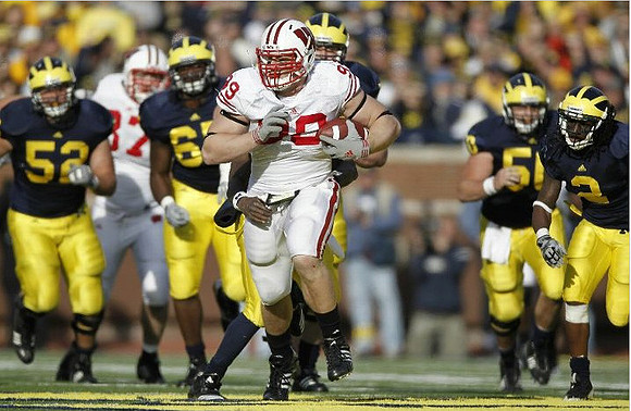 Stephen Schilling (52), Patrick Omameh (65), David Molk (50), and Vincent Smith (2)
