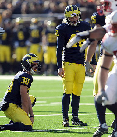 Doug Rogan (30) and Seth Broekhuizen (46), and Michael Schofield (75)