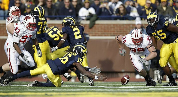 Mark Huyge (72), Stephen Schilling (52), Denard Robinson (16), Vincent Smith (2), and Patrick Omameh (65)