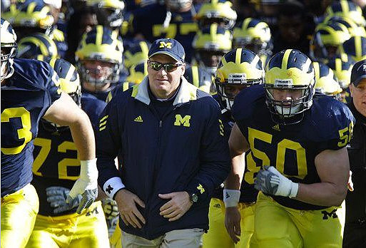 Ryan Van Bergen (53), Mark Huyge (72), Rich Rodriguez, and David Molk (50)