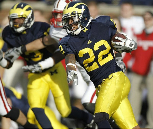 Carvin Johnson (13) and Darryl Stonum (22)