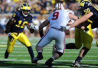 Denard Robinson (16) and David Molk (50)