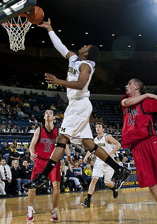 Darius Morris (4) and Zack Novak (0)
