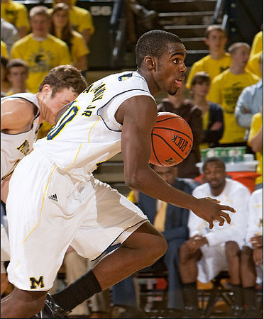 Zack Novak (0) and Tim Hardaway Jr. (10)