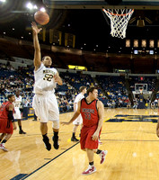 Jordan Morgan (52), Tim Hardaway Jr. (10), and Evan Smotrycz (23)
