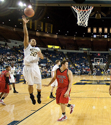 Jordan Morgan (52), Tim Hardaway Jr. (10), and Evan Smotrycz (23)