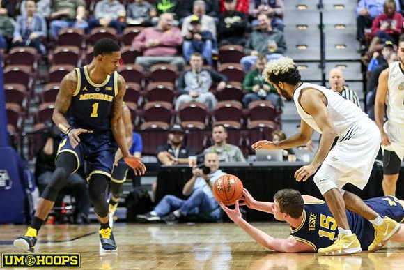 Charles Matthews (1) and Jon Teske (15)