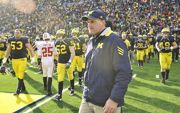 Ryan Van Bergen (53), Kevin Leach (52), Steve Watson (81), Rich Rodriguez, Drew Dileo (26), and John McColgan (49)