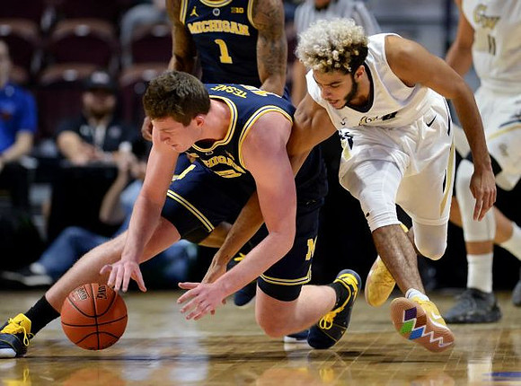 Jon Teske (15) and Charles Matthews (1)