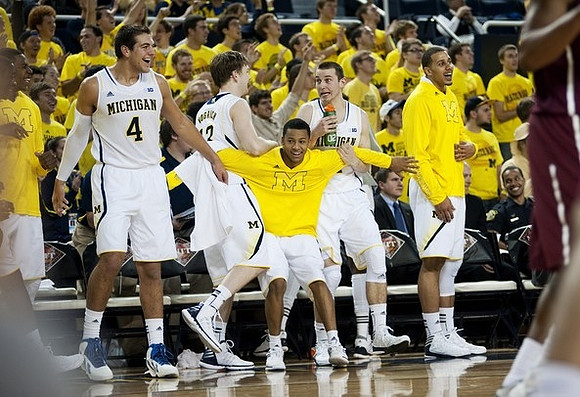 Mitch McGary (4), Matt Vogrich (13), Trey Burke (3), Nik Stauskas (11), and Jordan Morgan (52)