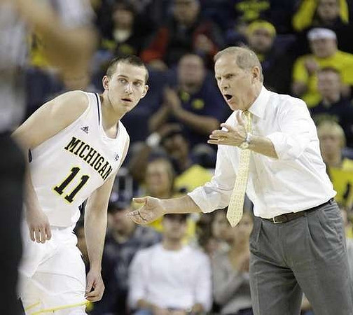 Nik Stauskas (11) and John Beilein