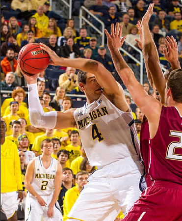 Spike Albrecht (2) and Mitch McGary (4)