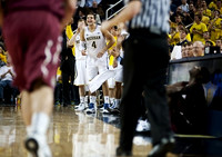 Matt Vogrich (13) and Mitch McGary (4)