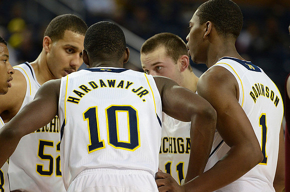 Trey Burke (3), Jordan Morgan (52), Tim Hardaway Jr. (10), Nik Stauskas (11), and Glenn Robinson III (1)